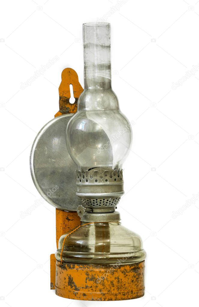 Vintage oil lamp on a white background