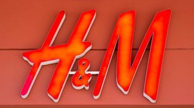  Clothing brand H&M logo on the front of the store
