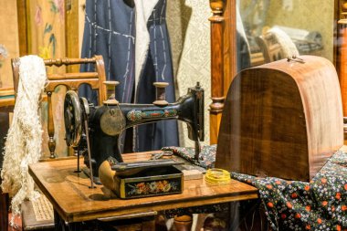 Vintage sewing machine and old sewing workshop