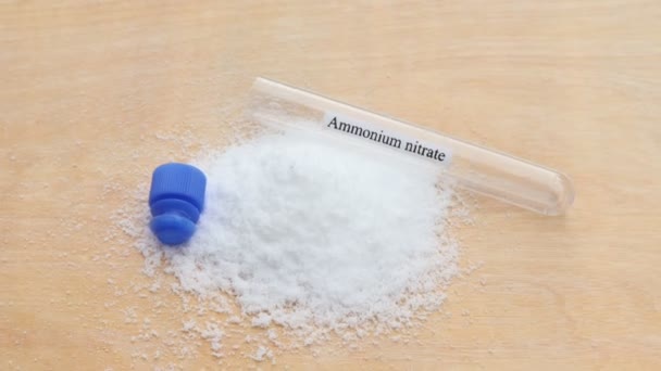 Ammonium Nitrate Test Tube Wood Background — Stock Video