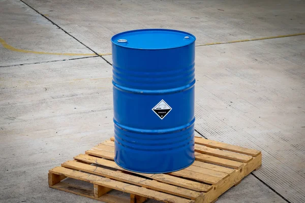 Corrosive chemical symbols on a blue chemical tank, chemical in factory