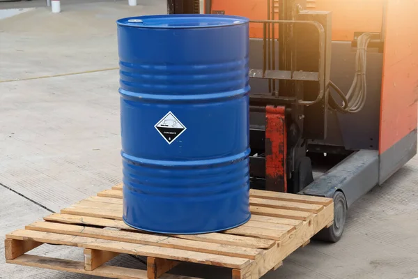 Corrosive chemical symbols on a blue chemical tank, chemical in factory