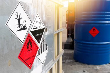 Warning symbol for chemical hazard on chemical container, chemical in factory 