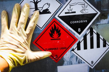 Warning symbol for chemical hazard on chemical container, chemical in factory 