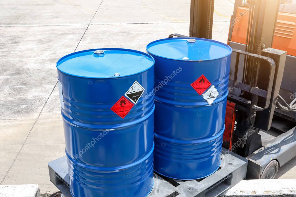 Warning symbol for chemical hazard on chemical container, chemical in factory 