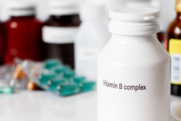 Vitamin B complex in bottle ,medicines are used to treat sick people.