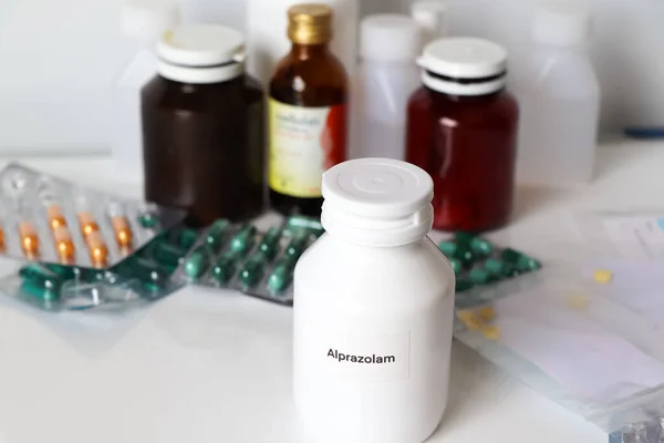 Alprazolam in bottle ,medicines are used to treat sick people.