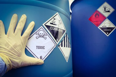 Warning symbol for chemical hazard on chemical container in industry 