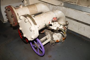 Old Valves on steel pipes, Valve tools used in the industry