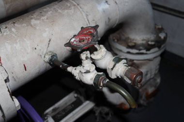 Old Valves on steel pipes, Valve tools used in the industry