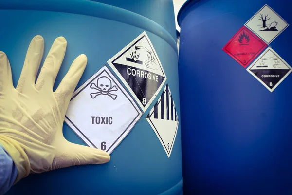 Warning symbol for chemical hazard on chemical container in industry