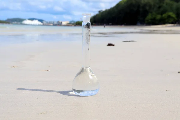 Sample of water in a chemical flask, Water samples to examine in the laboratory