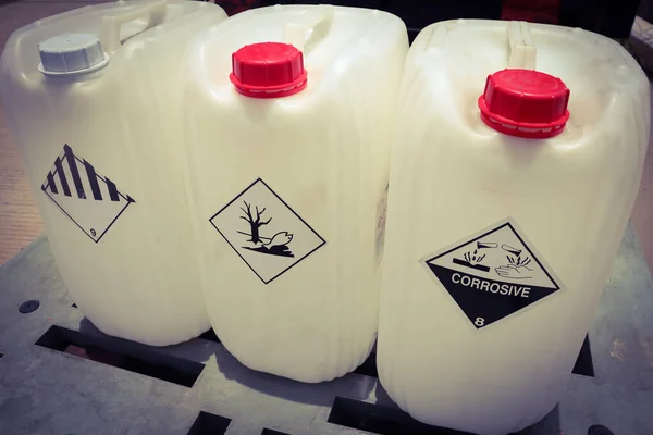 Warning symbol for chemical hazard on chemical container, product for industrial use or laboratory 