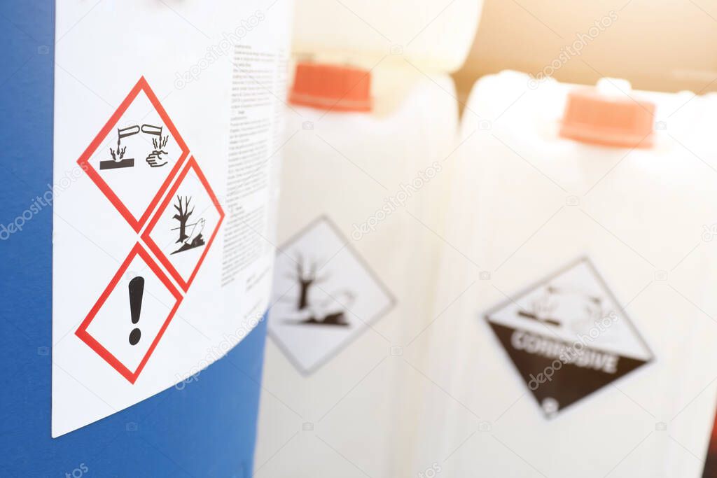 Warning symbol for chemical hazard on chemical container, product for industrial use or laboratory 