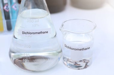 Dichloromethane in glass, chemical in the laboratory and industry
