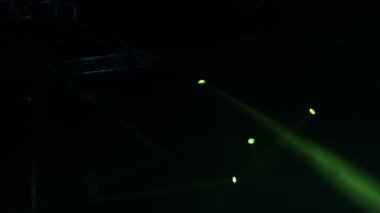 Shadows of people in a music Club and lights, Blurred image at night