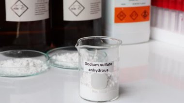 sodium sulfate anhydrous in glass, chemical in the laboratory and industry