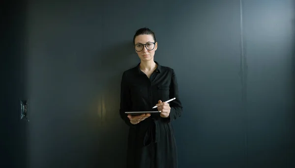 Businesswoman portrait in minimalist office workspace