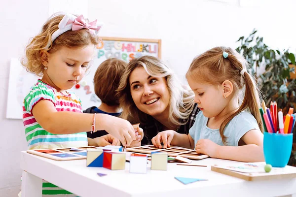 Portrait Young Happy Woman Sitting Table Colored Pencils Board Games — Fotografia de Stock