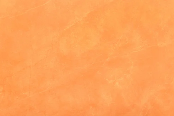 带抽象图样粉刷表面背景的橙色石膏墙纹理 — 图库照片