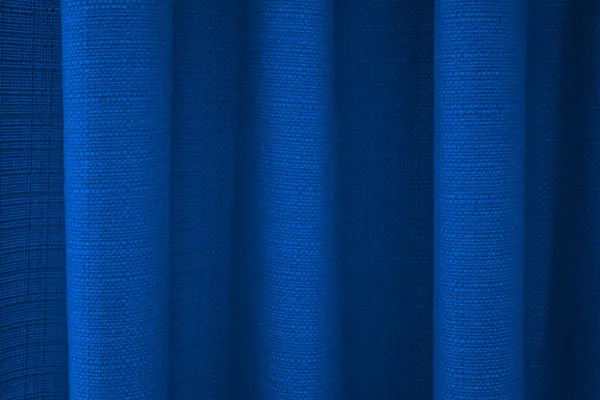 Fabric blue curtains with folds . Abstract background, curtain, drapes blue fabric. — Stock Photo, Image