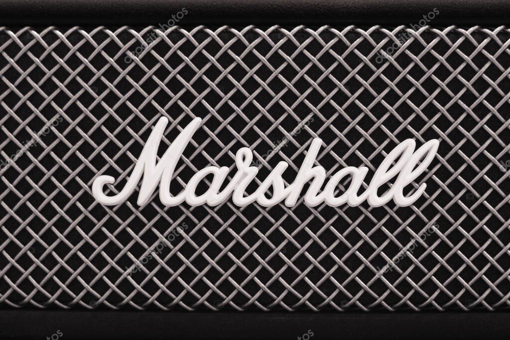 Marshall Amplification logo over speakers surface, close-up. Marshall is leading worldwide brand in sound amplification and musical instruments. Moscow, Russia: February 07, 2022.