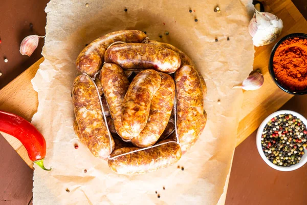 Grilled Sausages Spices Herbs Wooden Table — Stock Photo, Image