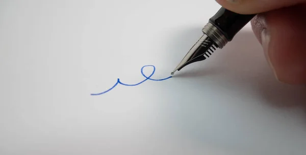 Fountain Pen Writing White Paper Blue Ink Signing Name — Stock Photo, Image