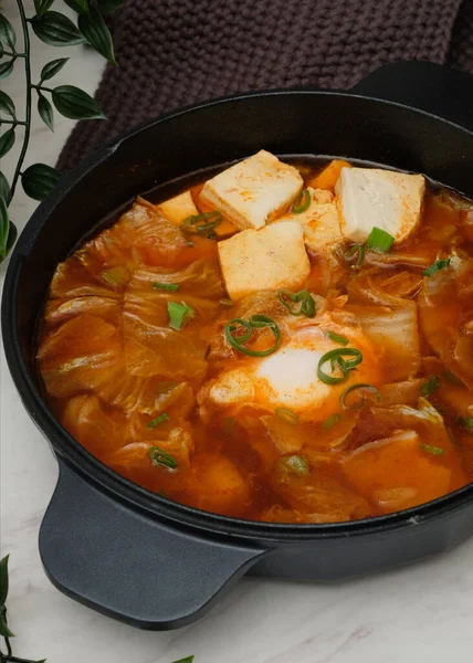 Korean spicy silken tofu stew which is called Sundubu Jjigae. Popular food in Korean Drama