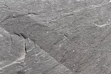 Çatlaklı doğal bazalt taşının dokusu.