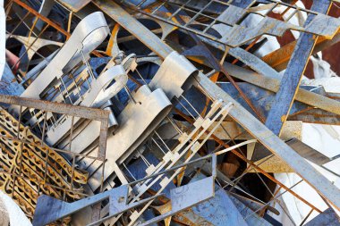 Lazer kesiminden sonra metal atığı tarafından oluşturulan soyut arkaplan