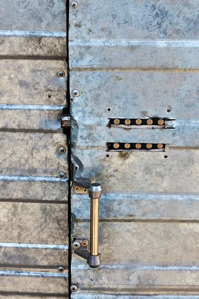 Push-button combination lock on a metal door — Stok fotoğraf