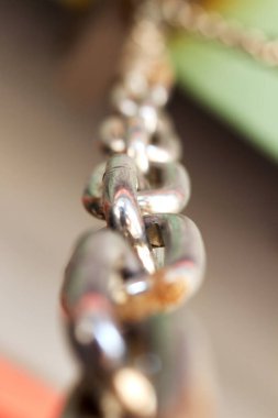stainless steel chain. selective focus with blurred foreground and background