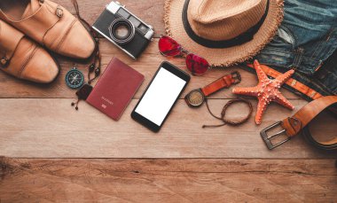 Travel accessories costumes. The cost of travel maps prepared for the trip.travel planning concept