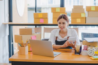 Small business owners online are chatting, selling products and checking orders for products that customers order. of online retailers - online shopping