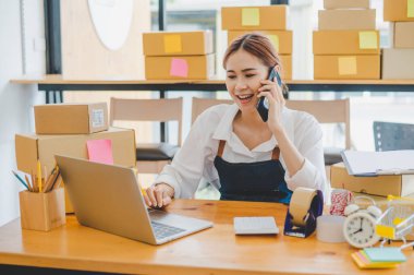Small business owners online are chatting, selling products and checking orders for products that customers order. of online retailers - online shopping