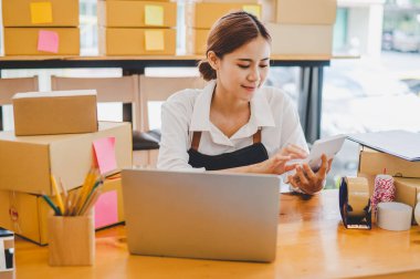 Small business owners online are chatting, selling products and checking orders for products that customers order. of online retailers - online shopping