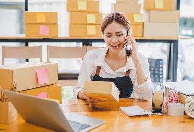 Small business owners online are chatting, selling products and checking orders for products that customers order. of online retailers - online shopping