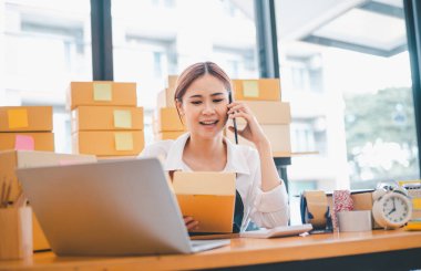 Small business owners online are chatting, selling products and checking orders for products that customers order. of online retailers - online shopping