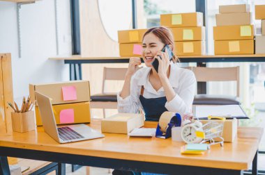 Small business owners online are delighted with their customers' orders. and check the orders that the customers have ordered of online retailers - online shopping