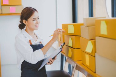 Small business owners online are checking their orders. where customers place orders and check the orders that the customers have ordered of online retailers - online shopping