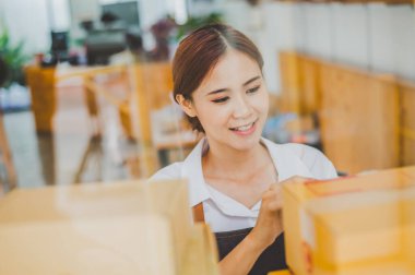 Small business owners online are checking their orders. where customers place orders and check the orders that the customers have ordered of online retailers - online shopping