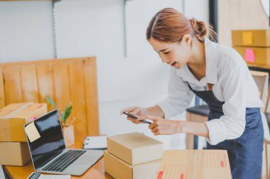 Small business owners online are taking pictures of their products and offering them to customers who will place their orders. and check the orders that the customers have ordered of online retailers - online shopping