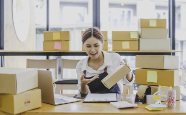 Small business owners online are offering their customers their orders and products via video call. and check the orders that the customers have ordered of online retailers - online shopping