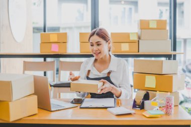 Small business owners online are offering their customers their orders and products via video call. and check the orders that the customers have ordered of online retailers - online shopping