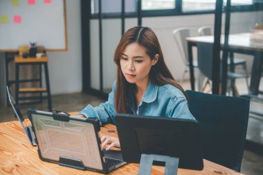 Female programmers are thinking and planning to work on programming, software coding and web design.Concept technology development.