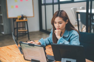 Female programmers are thinking and planning to work on programming, software coding and web design.Concept technology development.