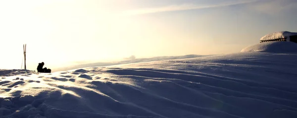 Lone Skier Resting Atop Ski Slope Run Skis Standing Upright Royalty Free Stock Photos