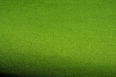 Yeşil keten kumaş. Yeşil örtü. Kumaş yakın plan.