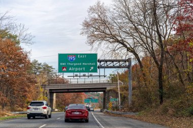 Hanover, MD - Nov. 25, 2021: Driving on MD-295 approaching the Exit for I-195 East to BWI Thurgood Marshall Airport. clipart